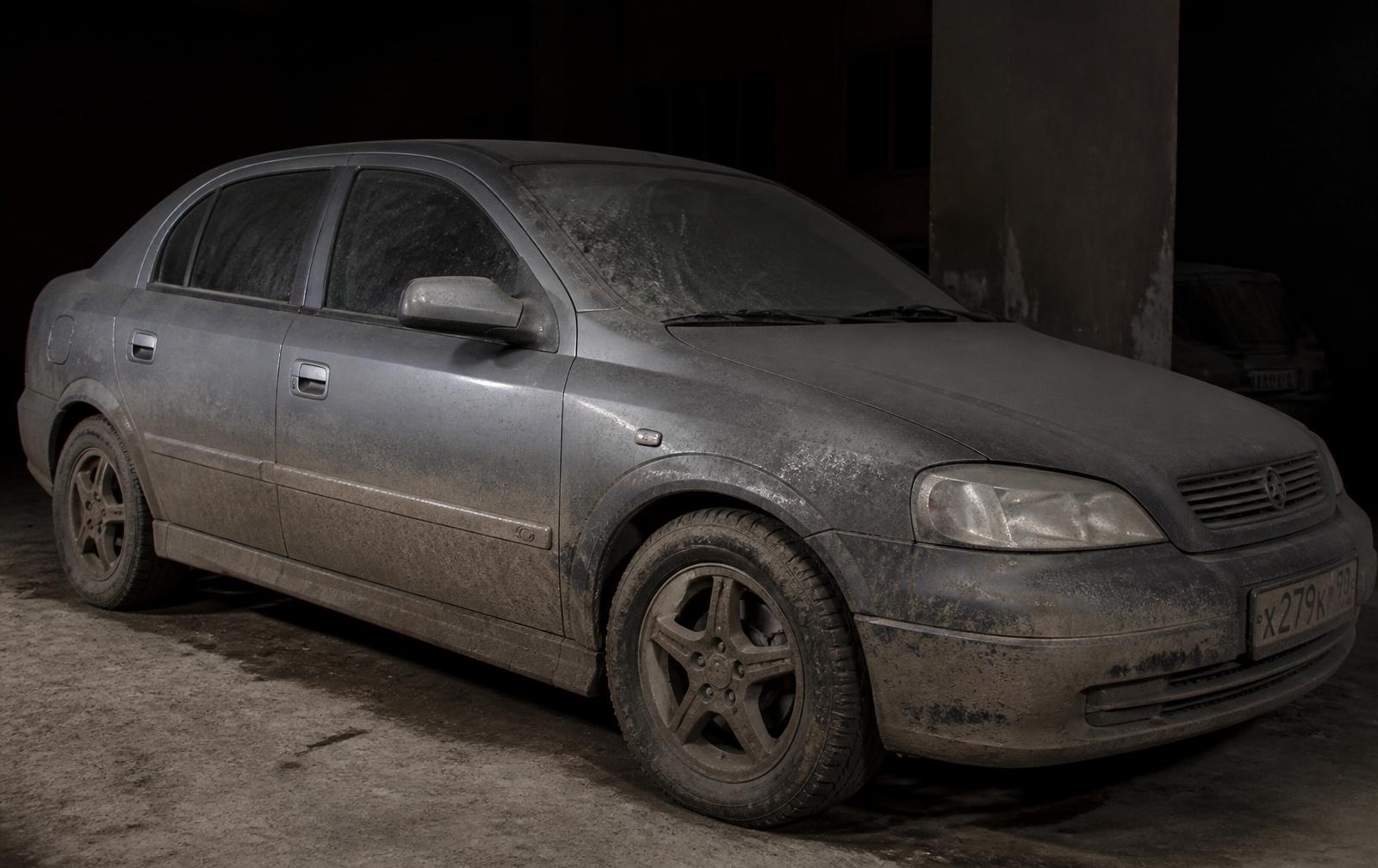 Vehicle before detailing, covered in dirt